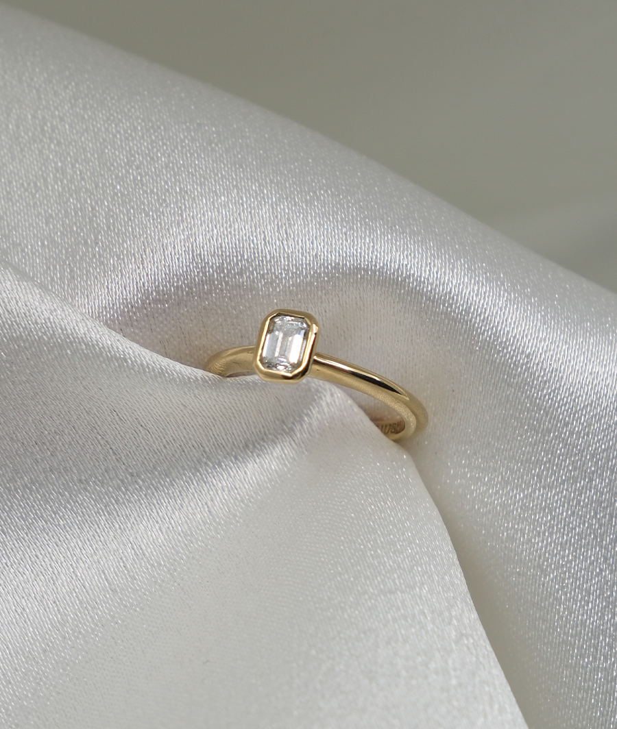Fine Emerald Cut Diamond Solitaire