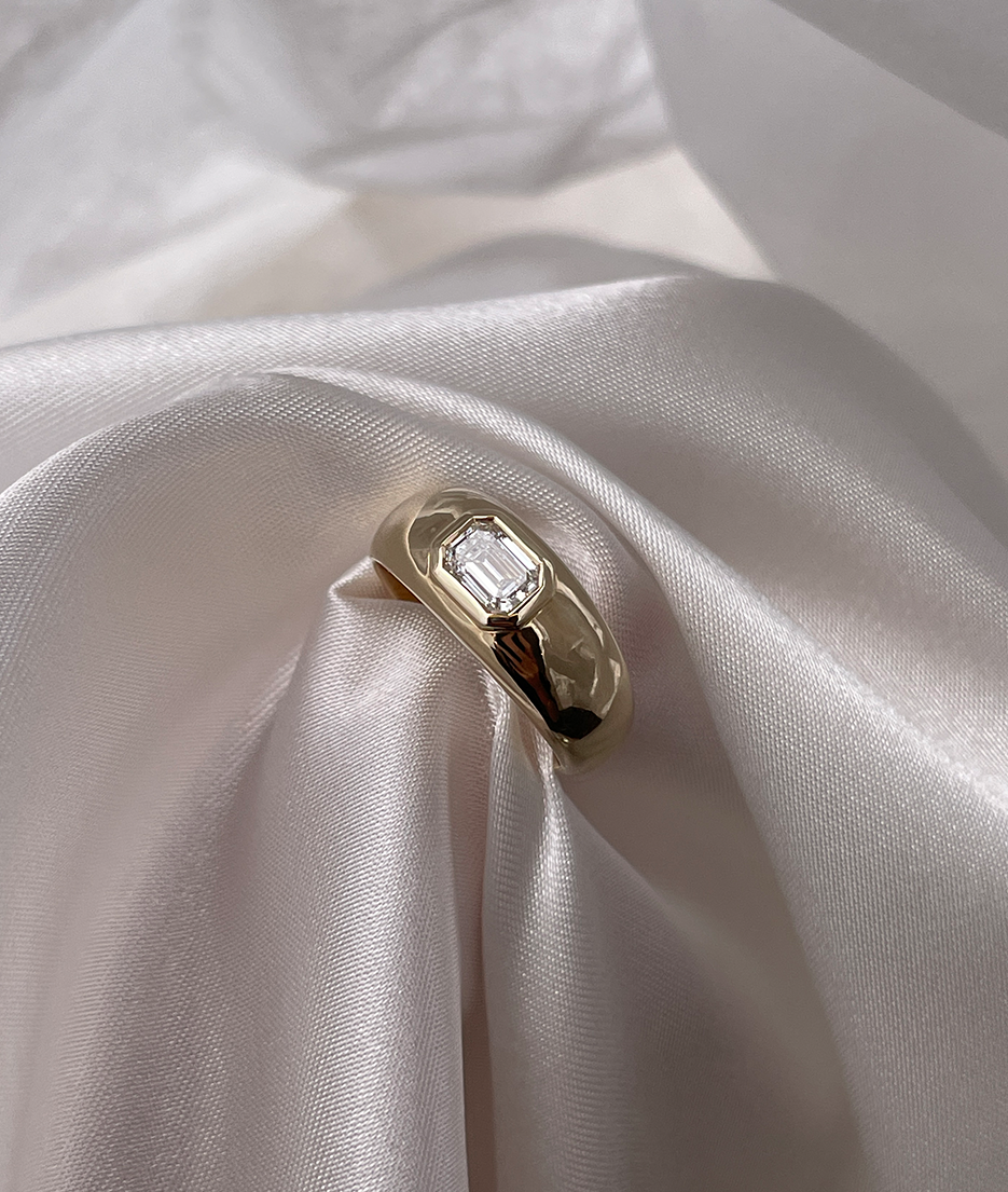 Chunky organic shaped gold ring with emerald cut diamond bezel set in centre. Handmade gold rings, engagement ring and wedding bands by RUUSK jewellery. Customise your ring online, made to order in solid Gold in Sydney.