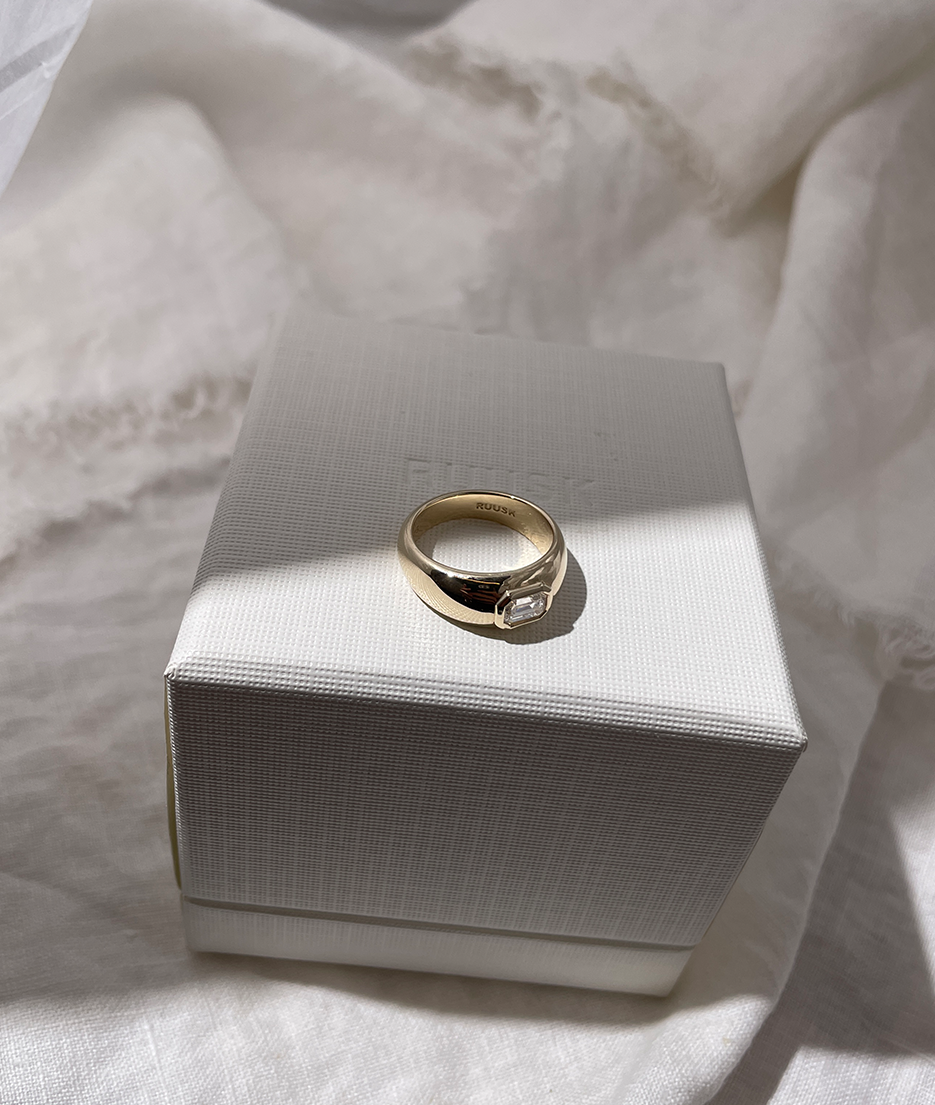Chunky organic shaped gold ring with emerald cut diamond bezel set in centre. Handmade gold rings, engagement ring and wedding bands by RUUSK jewellery. Customise your ring online, made to order in solid Gold in Sydney.