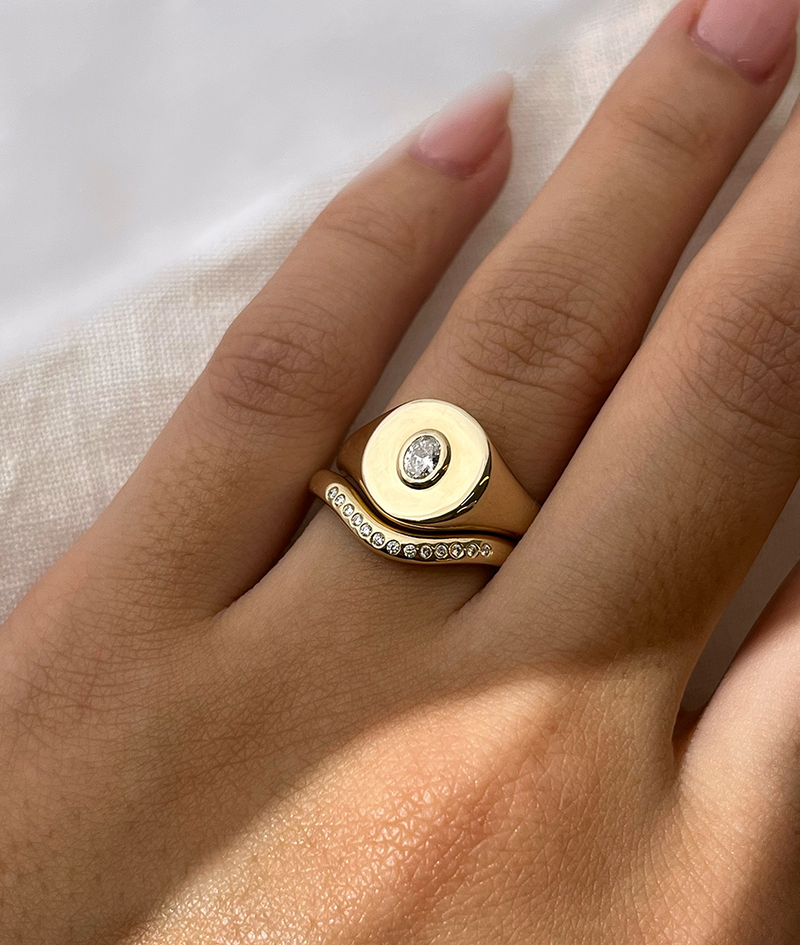 Oval Bezel-Set Small Signet Ring, cast in solid Gold. Handmade womens signet ring featuring a conflict-free Diamond. Made to order in Sydney Australia. Bespoke and Custom rings for the modern woman and bride.