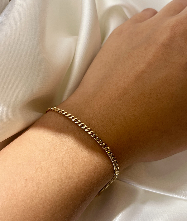 Solid Gold Curb Chain Bracelet on Hand 