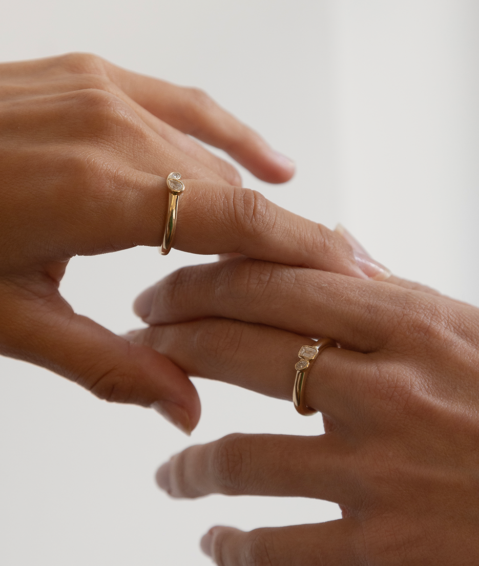 Mini Oval and Emerald Toi et Moi ring featuring bezel set oval and emerald diamonds, cast in solid Gold. Mindful jewellery and unique engagement rings for the modern woman and bride. Made in Sydney Australia. Friendship rings