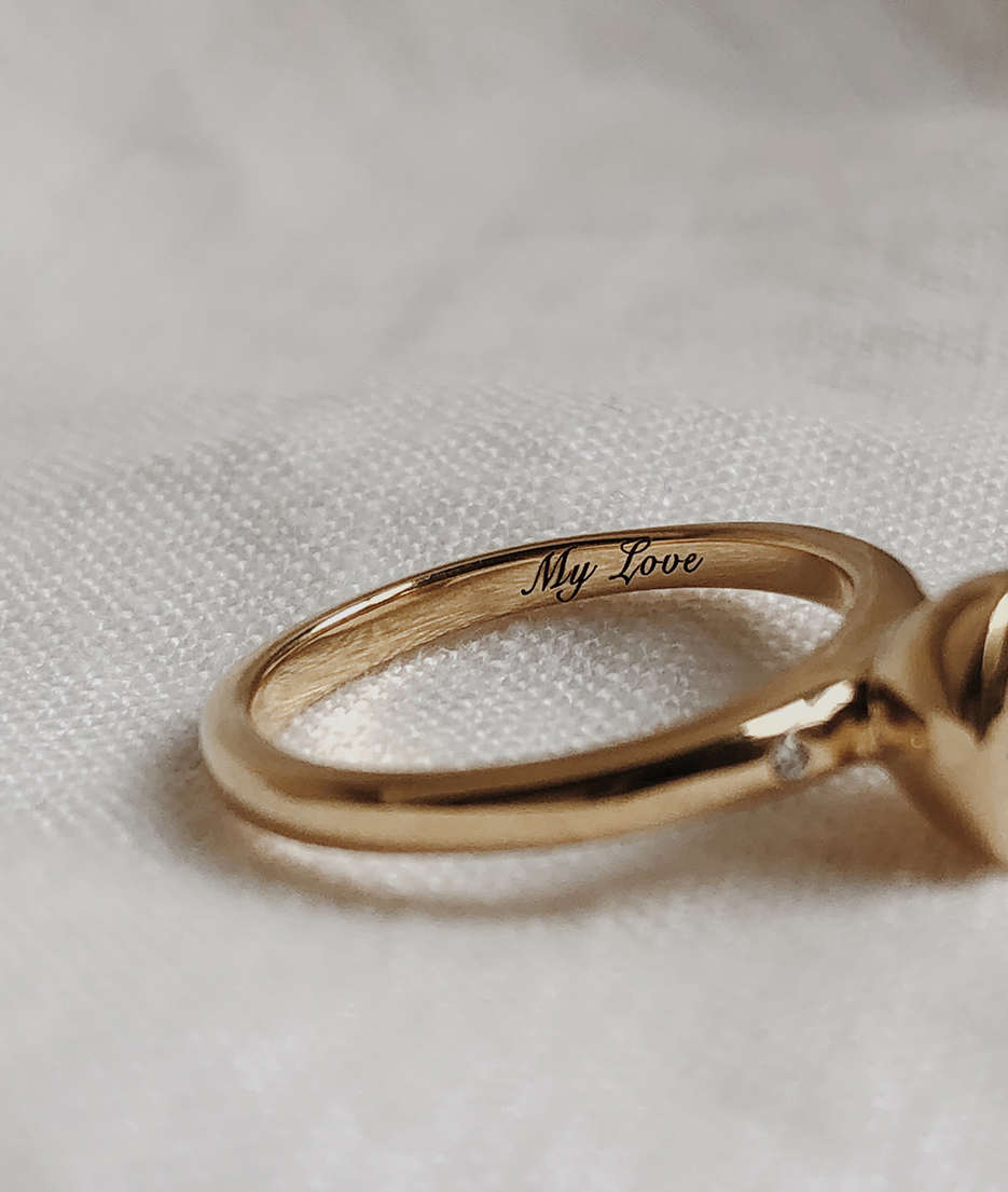 Emerald Cut Diamond bezel set Solitaire ring, cast in solid Gold with laser engraving. Handcrafted to order in Sydney Australia. Minimal Diamond Engagement ring ideal for stacking with other bands. Custom engagement and wedding rings.