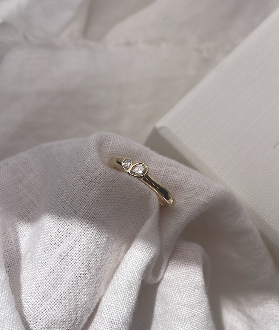 Mini Pear Toi et Moi featuring bezel set pear diamonds, cast in solid Gold. Mindful jewellery, unique engagement rings for the modern woman and bride and friendship rings. Made in Sydney Australia