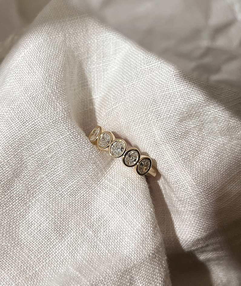 Handmade Oval Medium 5 Suns Ring in solid gold. Hand crafted to order in Sydney. Meaningful heirlooms, engagement rings and wedding bands for the Modern bride. Conscious jewellery.