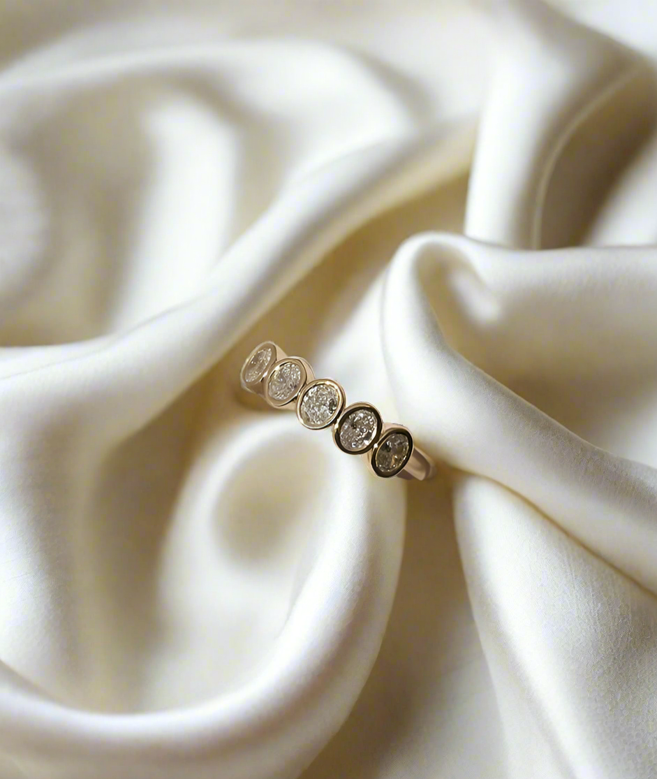 Handmade Oval Medium 5 Suns Ring in solid gold. Hand crafted to order in Sydney. Meaningful heirlooms, engagement rings and wedding bands for the Modern bride. Conscious jewellery.