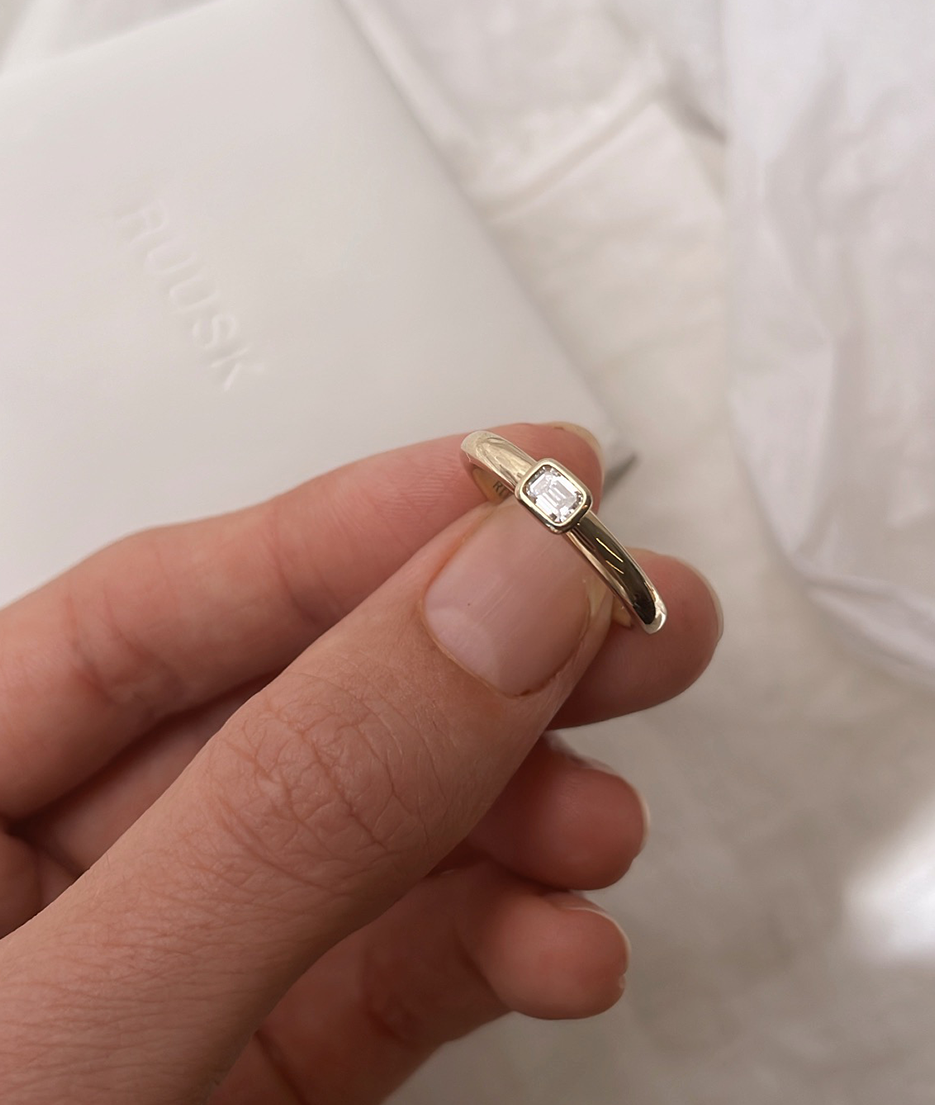 Handmade Mini Solitaire ring by RUUSK jewellery. Emerald Diamond Mini Solitaire, cast in solid Gold. Mindful jewellery and unique engagement rings for the modern woman and bride. Made in Sydney Australia