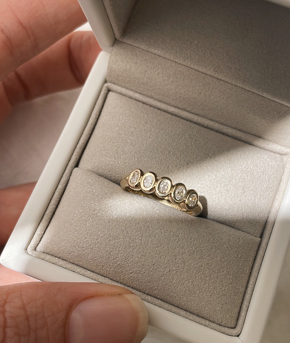 Handmade Mini 5 Suns engagement ring in solid gold. Hand crafted to order in Sydney. Meaningful heirlooms, engagement rings and wedding bands for the Modern bride. Conscious jewellery.