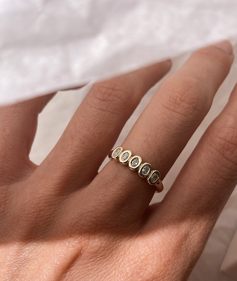 Handmade Mini 5 Suns engagement ring in solid gold. Hand crafted to order in Sydney. Meaningful heirlooms, engagement rings and wedding bands for the Modern bride. Conscious jewellery.