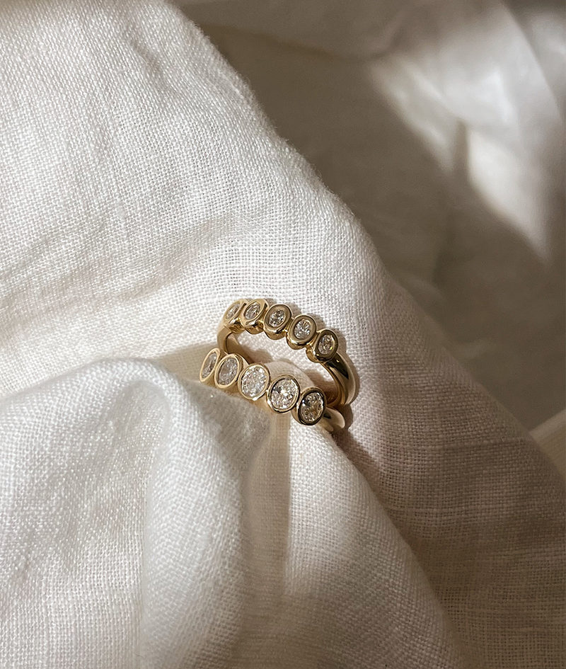 Handmade Oval Medium 5 Suns Ring in solid gold. Hand crafted to order in Sydney. Meaningful heirlooms, engagement rings and wedding bands for the Modern bride. Conscious jewellery.