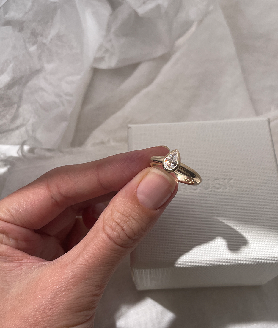 Hand carved bezel set Solitaire ring, cast in solid Gold. Handcrafted to order in Sydney Australia. Minimal Diamond Engagement ring ideal for stacking with other bands. Custom engagement and wedding rings.