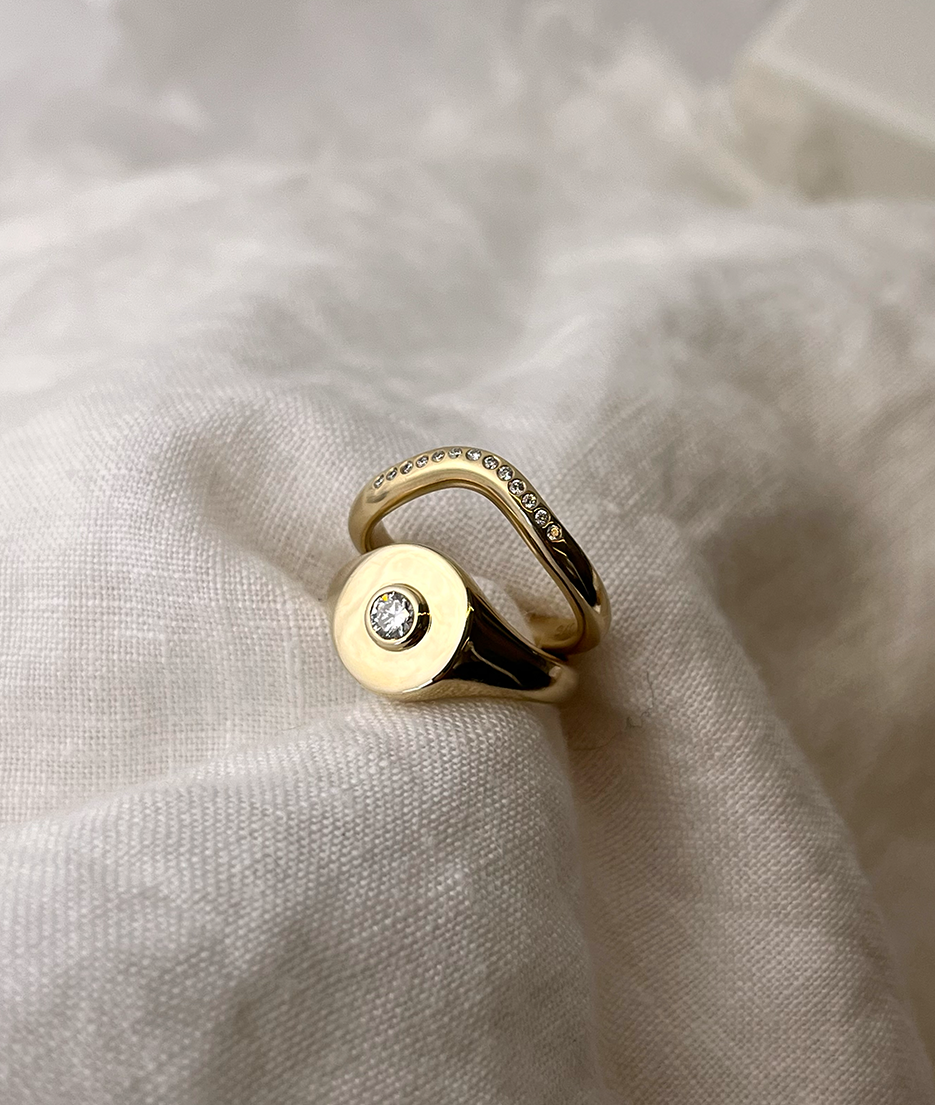 Handmade solid gold womens signet ring featuring a conflict-free Diamond. Round diamond bezel set in the centre of the signet face, cast in solid Gold. Made to order in Sydney Australia. Bespoke and Custom rings for the modern woman and bride.