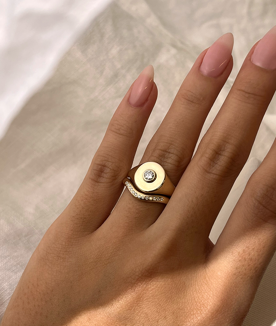 Handmade solid gold womens signet ring featuring a conflict-free Diamond. Round diamond bezel set in the centre of the signet face, cast in solid Gold. Made to order in Sydney Australia. Bespoke and Custom rings for the modern woman and bride.