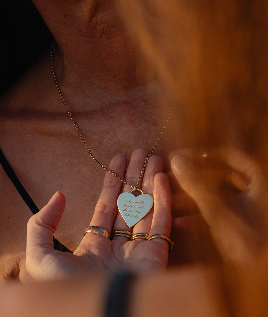 With Great Love Solid Gold Large Heart Pendant, with hand engraving and medium chain worn on body