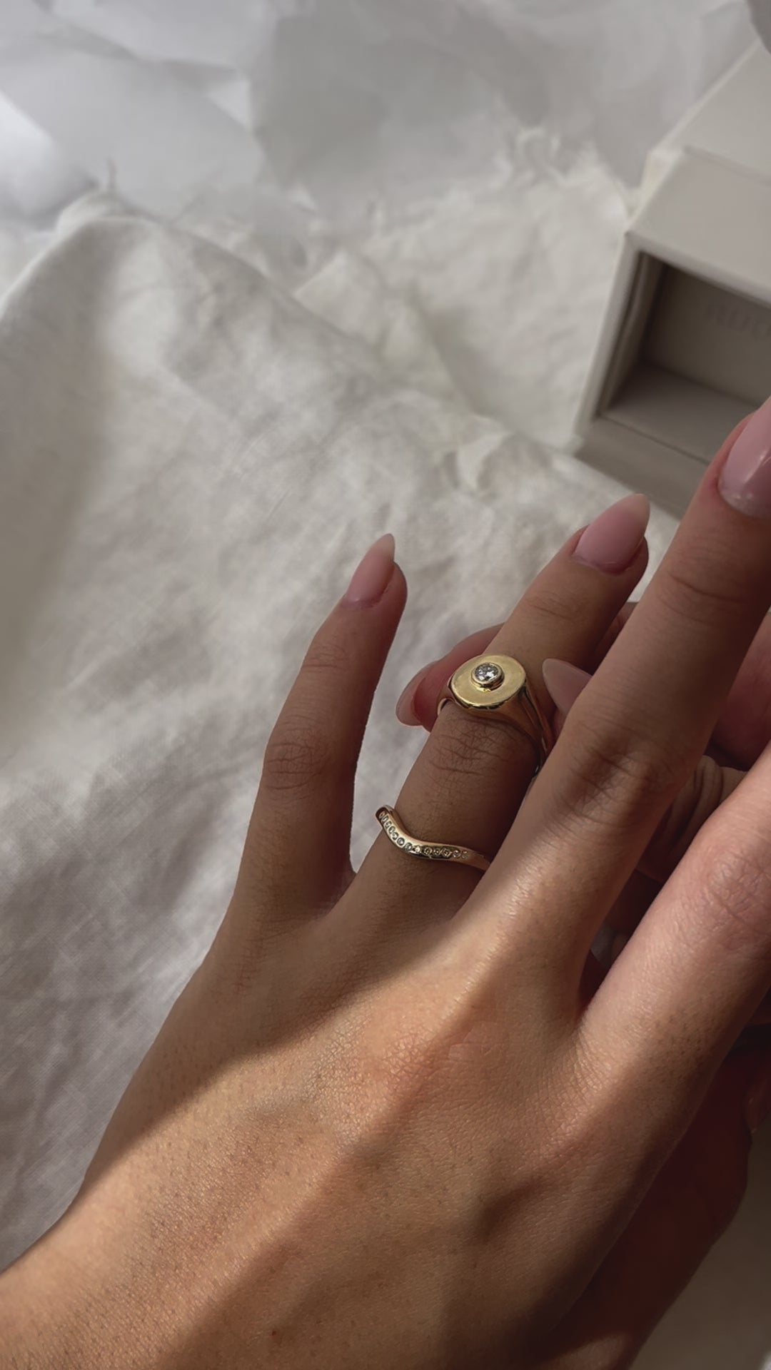Load video: Handmade solid gold womens signet ring featuring a conflict-free Diamond. Round diamond bezel set in the centre of the signet face, cast in solid Gold. Made to order in Sydney Australia. Bespoke and Custom rings for the modern woman and bride.