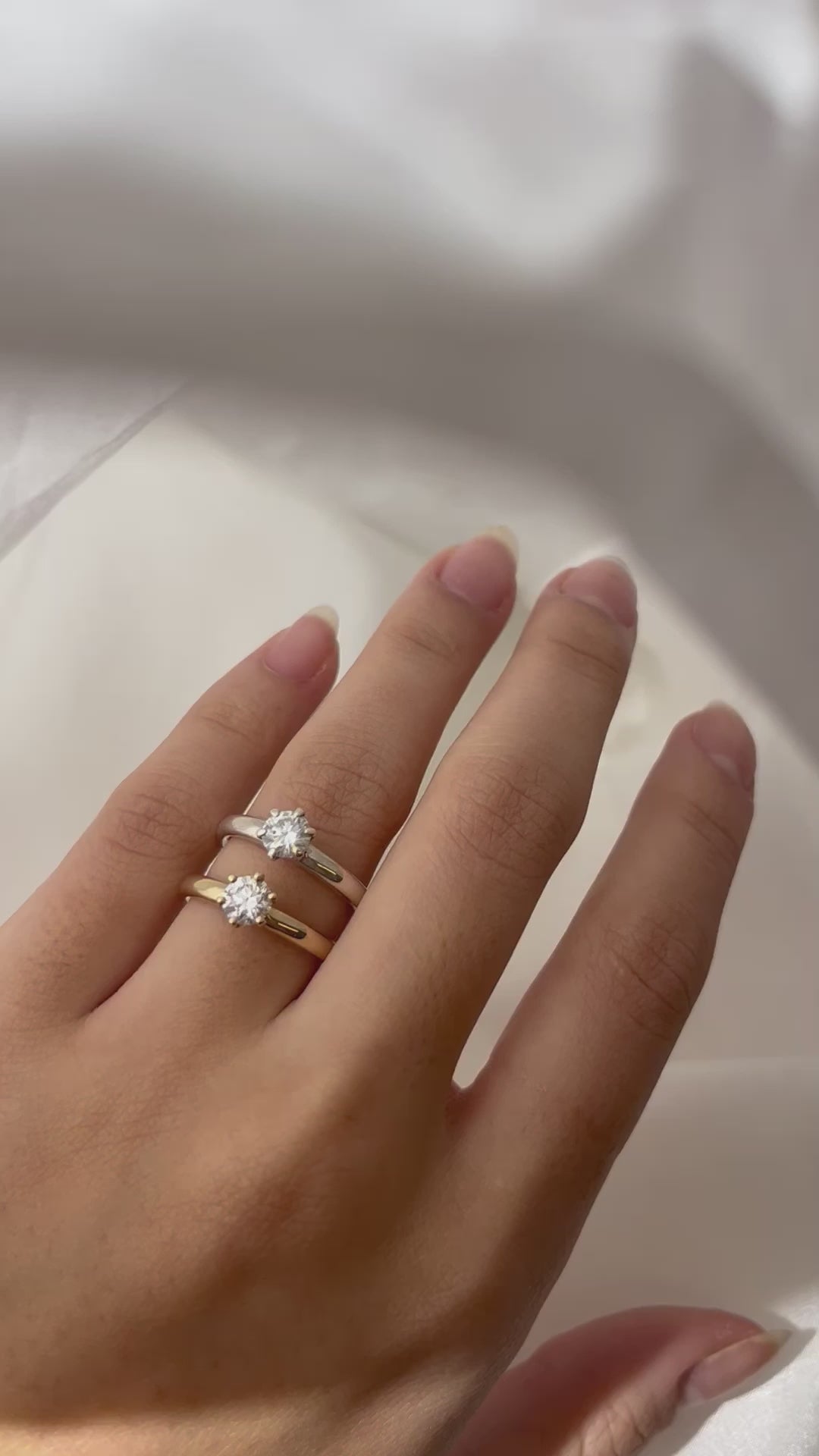 Load video: 0.5ct Claw-Set Solitaire in white and yellow gold