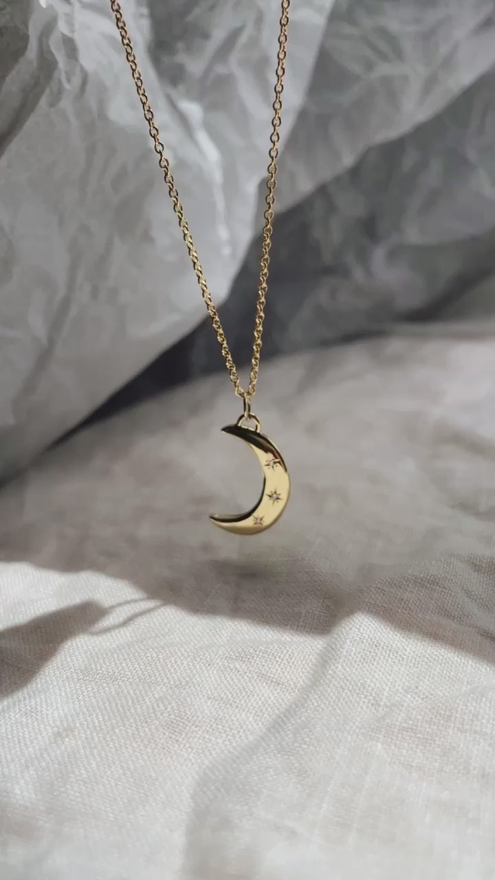 Load video: READYMADE Crescent Moon &amp; 3 Stars necklace