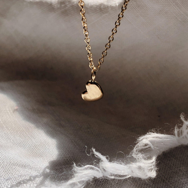 Plain gold store heart necklace